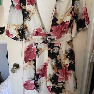 Deep neckline + Dressy Akira Floral Romper
